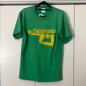 Green 'In Oklahoma' Graphic T-Shirt Yellow print Cow Tipping Humor USA Humor
